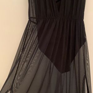 Deep V bodysuit with sheer attached skirt.